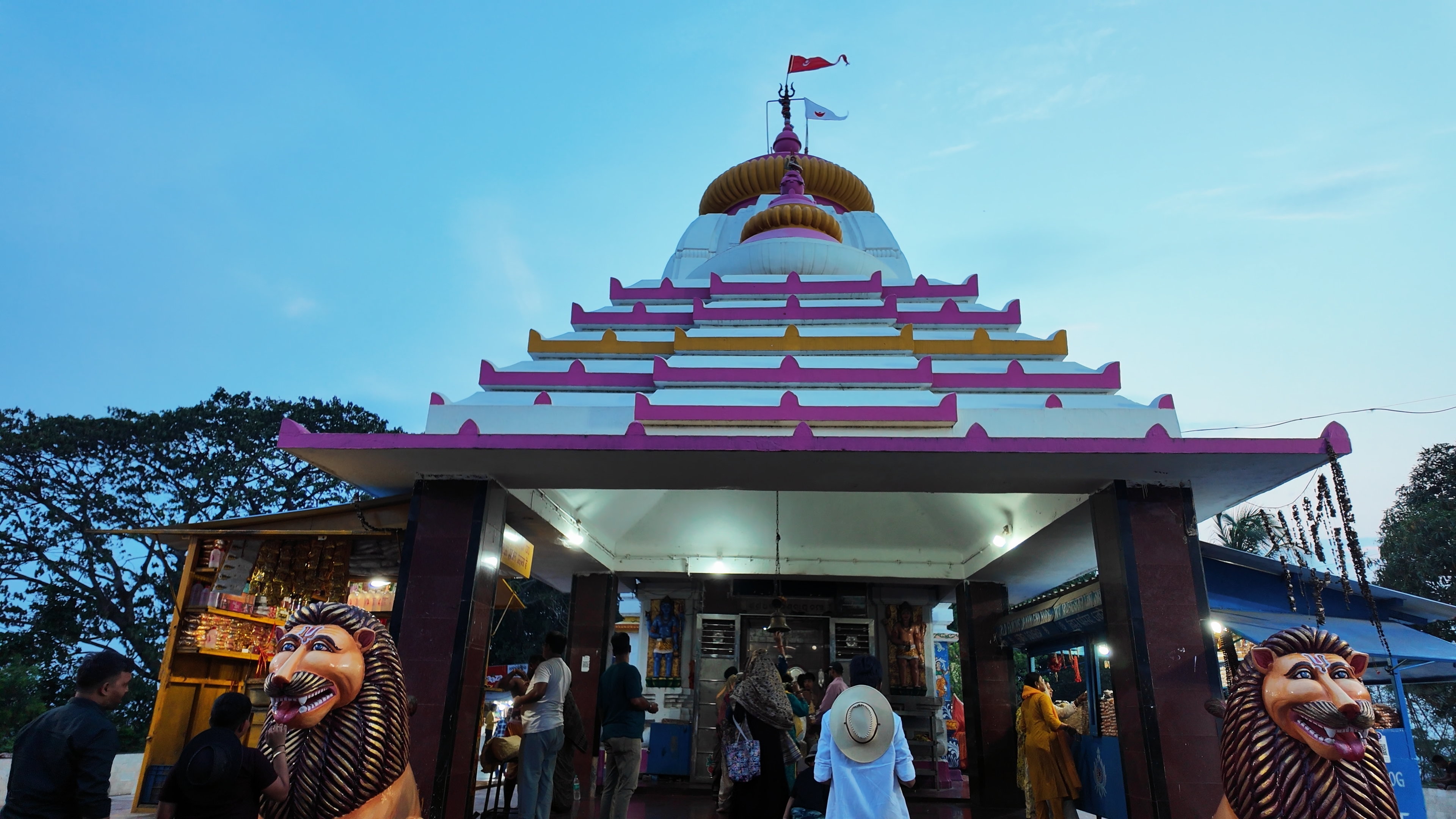 Dhableshwar Temple complex behind the Dhauli Peace Stupa
