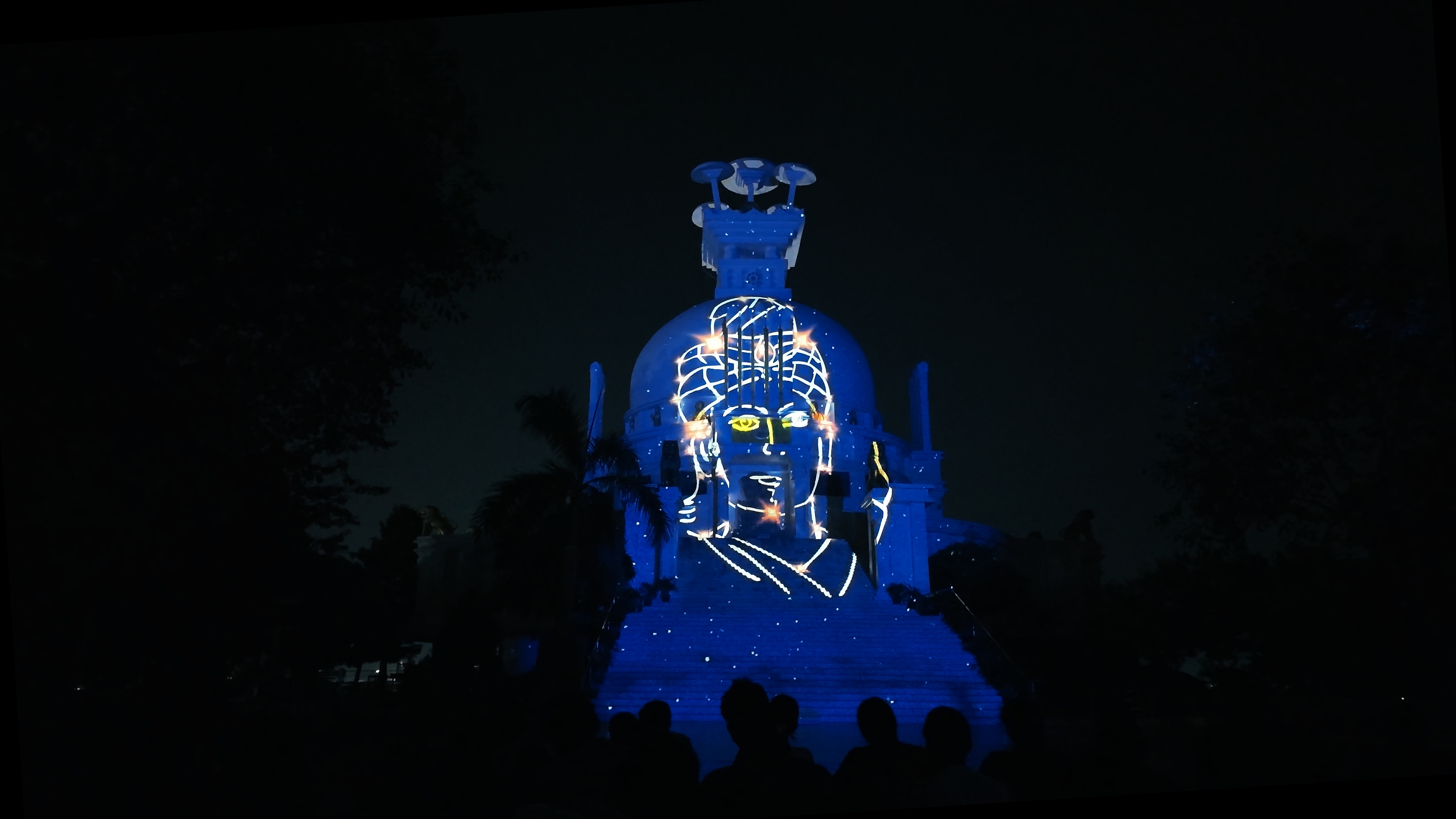 Light and sound show projected onto the Dhauli Peace Stupa in the evening