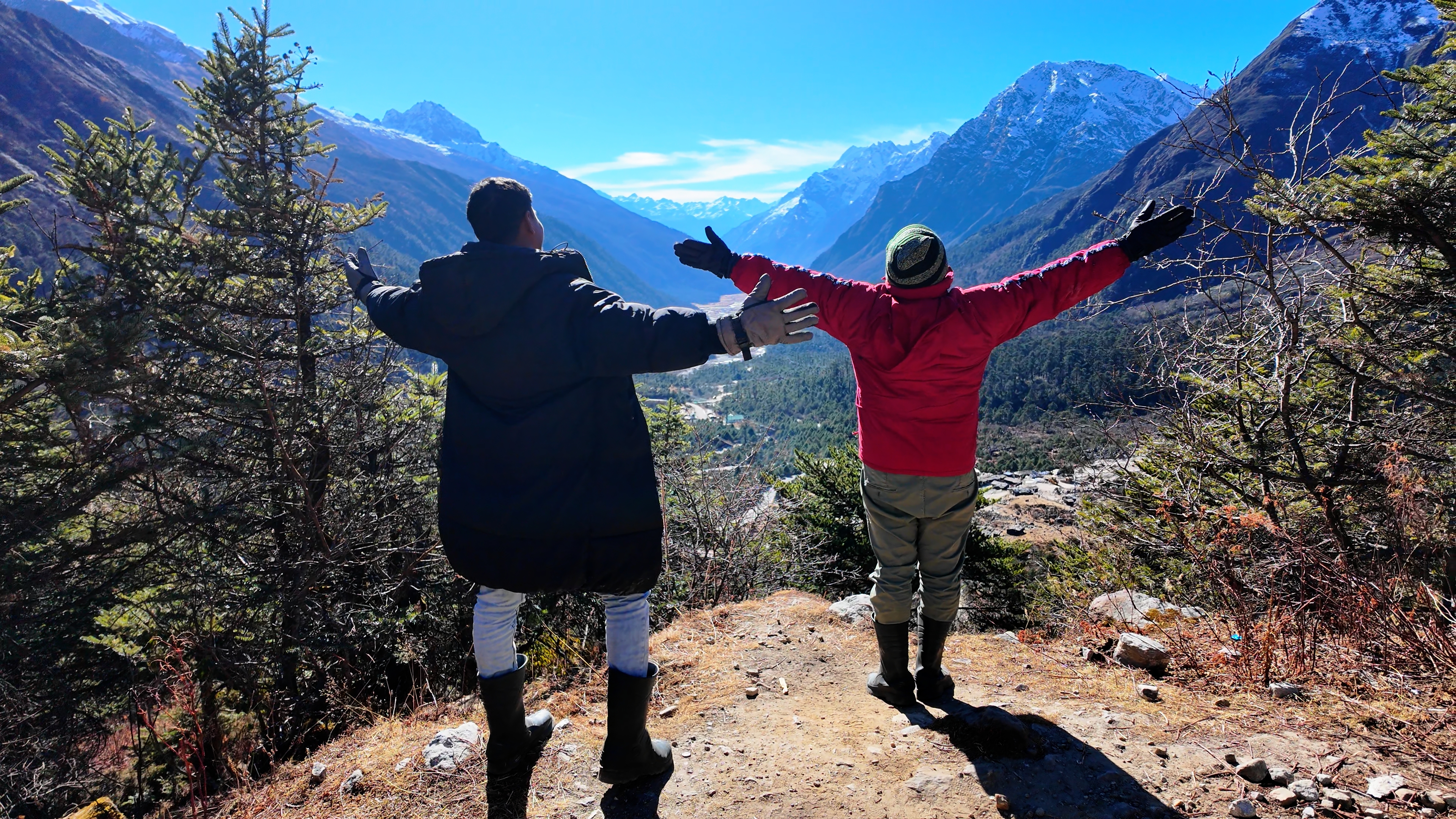 Gadadhar and the narrator at a viewpoint on the way to Zero Point