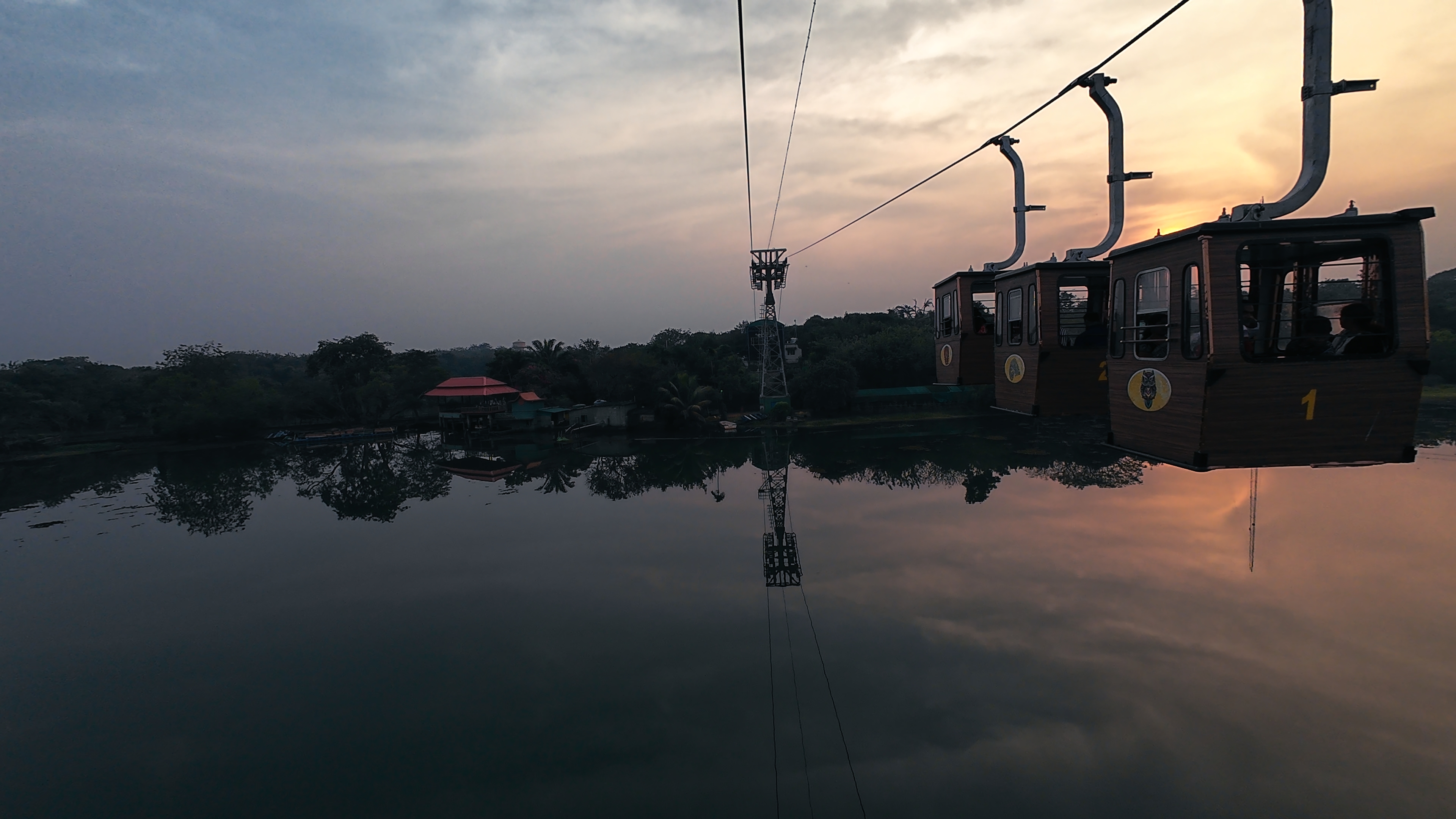 Ropeway cabin over Kanjia Lake at evening