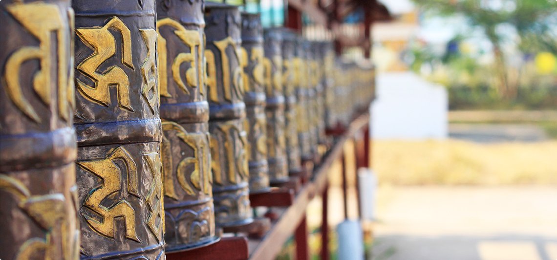 Prayer wheels at Jirang Buddhist monastery